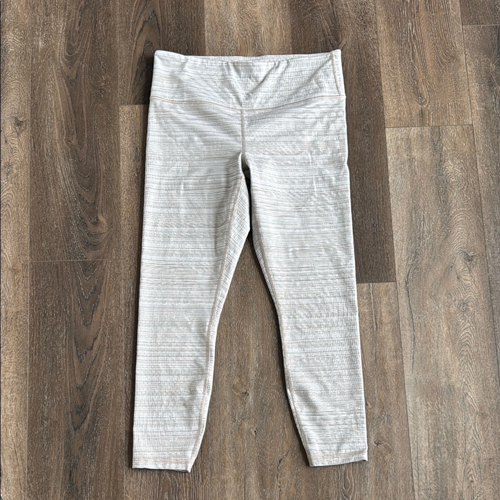 Athleta Leggings.  Women’s size medium.  Tan in color with textured stripes.